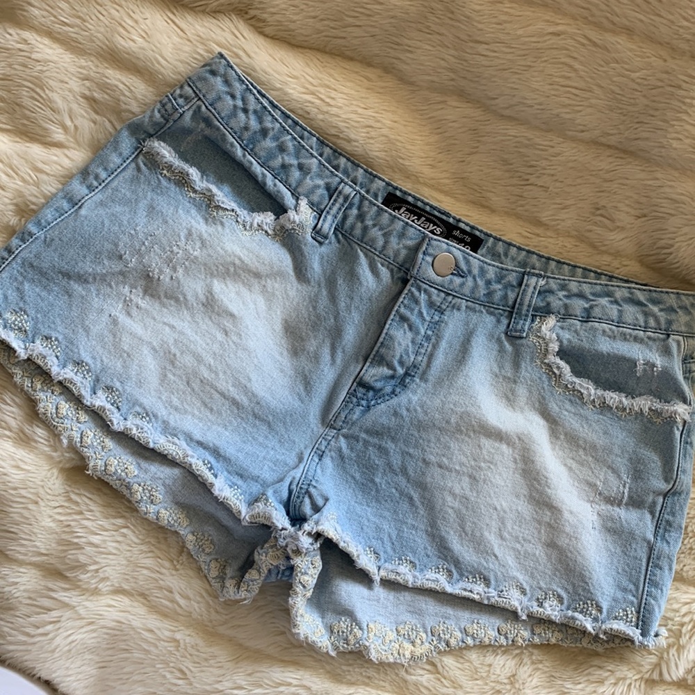 Low rise denim jean shorts with embroidered detailing 12